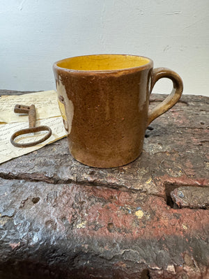 A slipware mug  for 'Matilda'  by Isaac Button of Soil Hill, Halifax