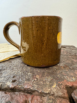 A slipware mug  for 'George'  by Isaac Button of Soil Hill, Halifax