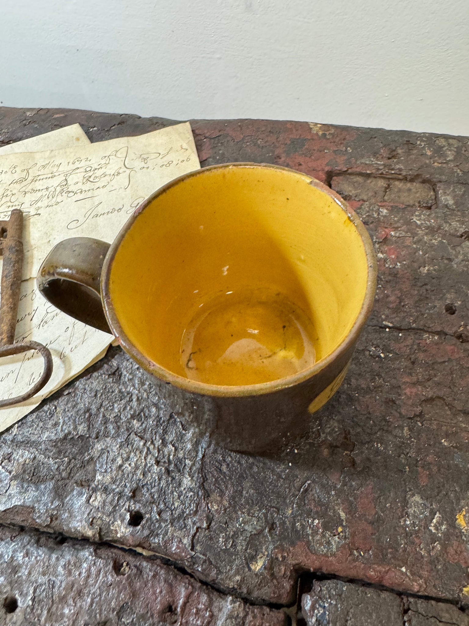 A slipware mug  for 'George'  by Isaac Button of Soil Hill, Halifax