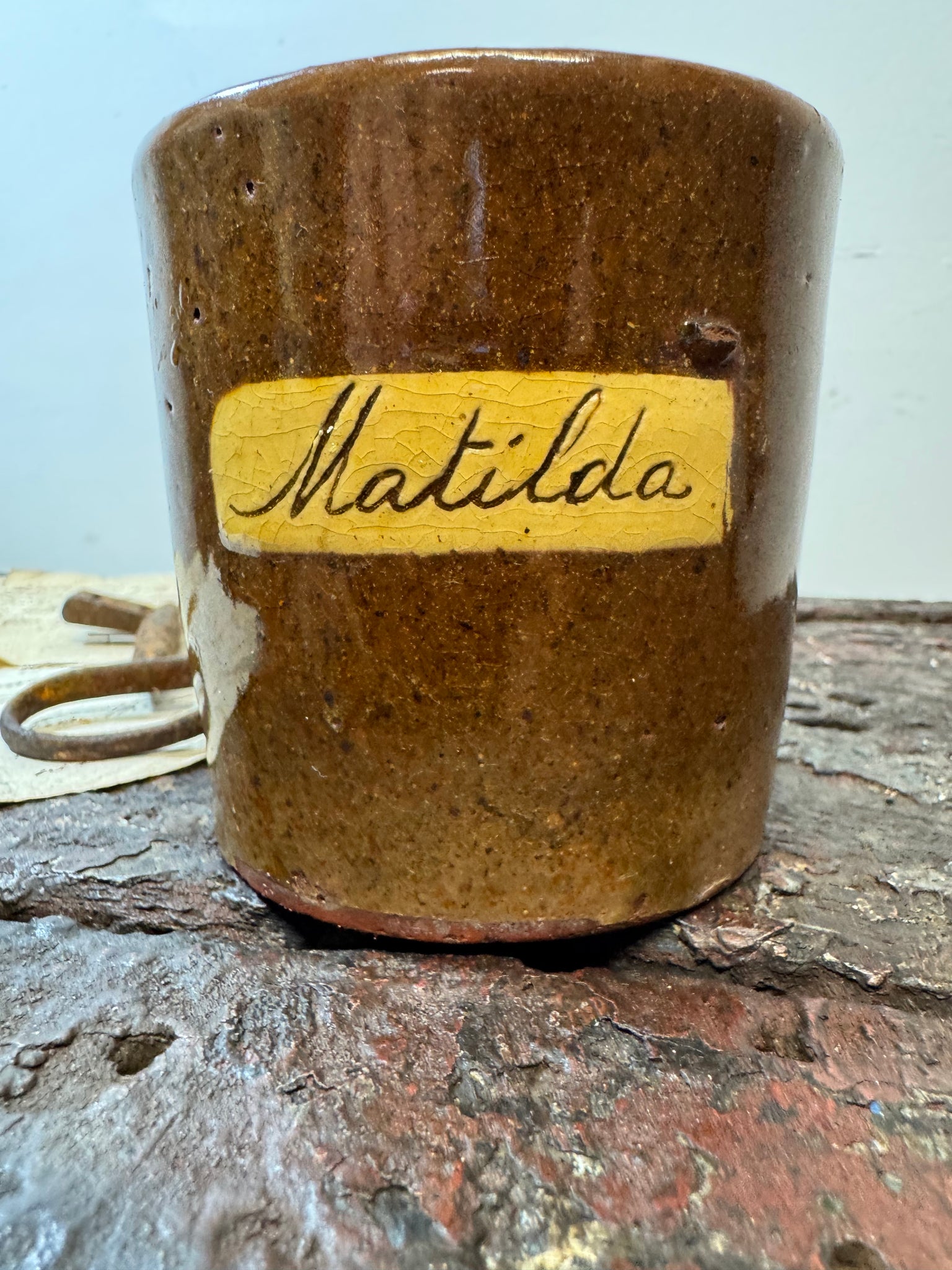 A slipware mug  for 'Matilda'  by Isaac Button of Soil Hill, Halifax