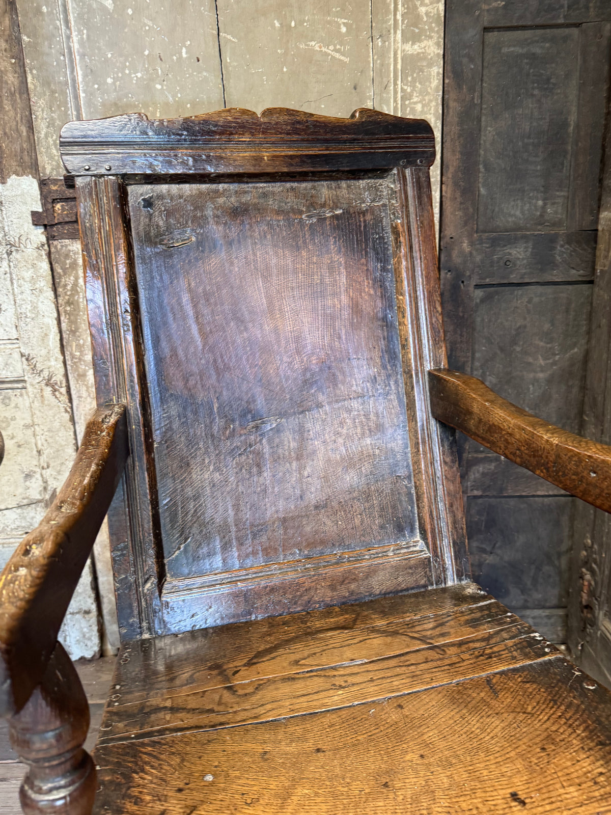 A North country 17th century oak wainscot armchair of excellent colour