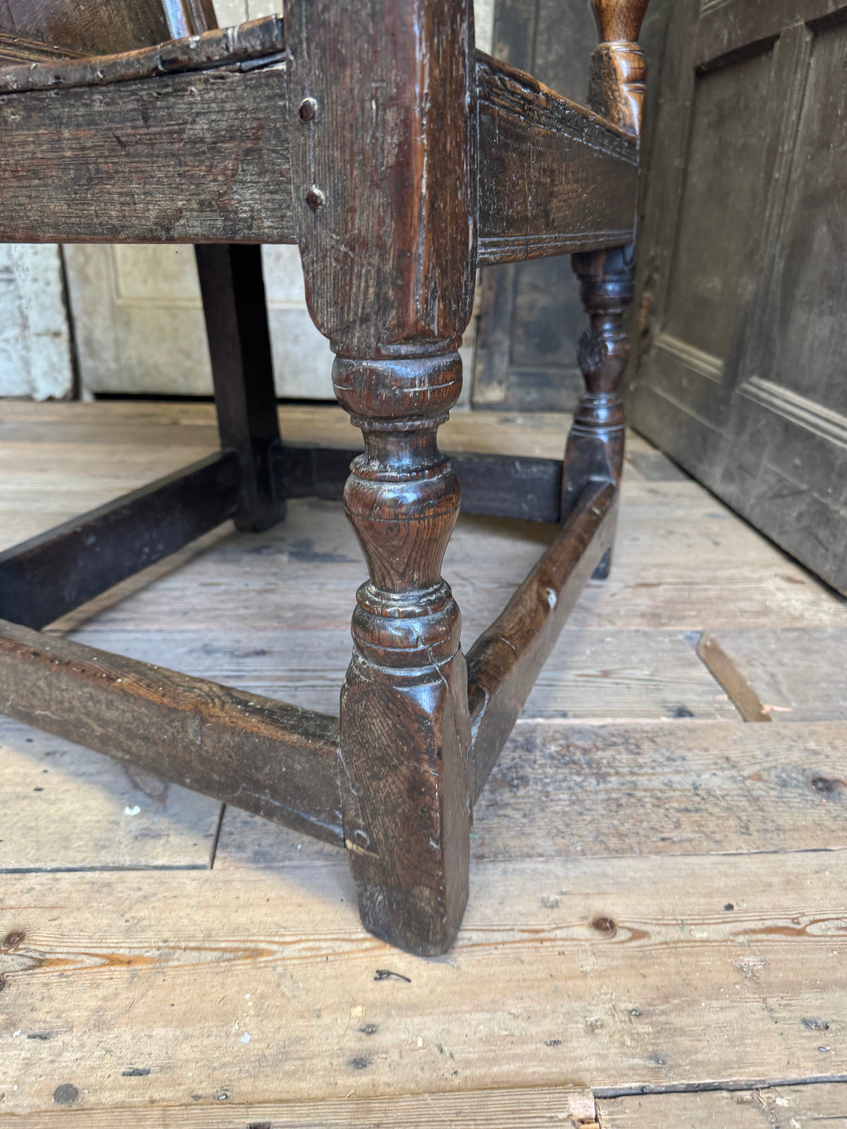 A North country 17th century oak wainscot armchair of excellent colour