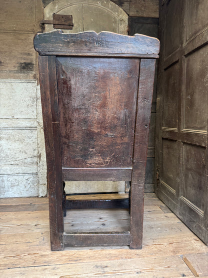A North country 17th century oak wainscot armchair of excellent colour