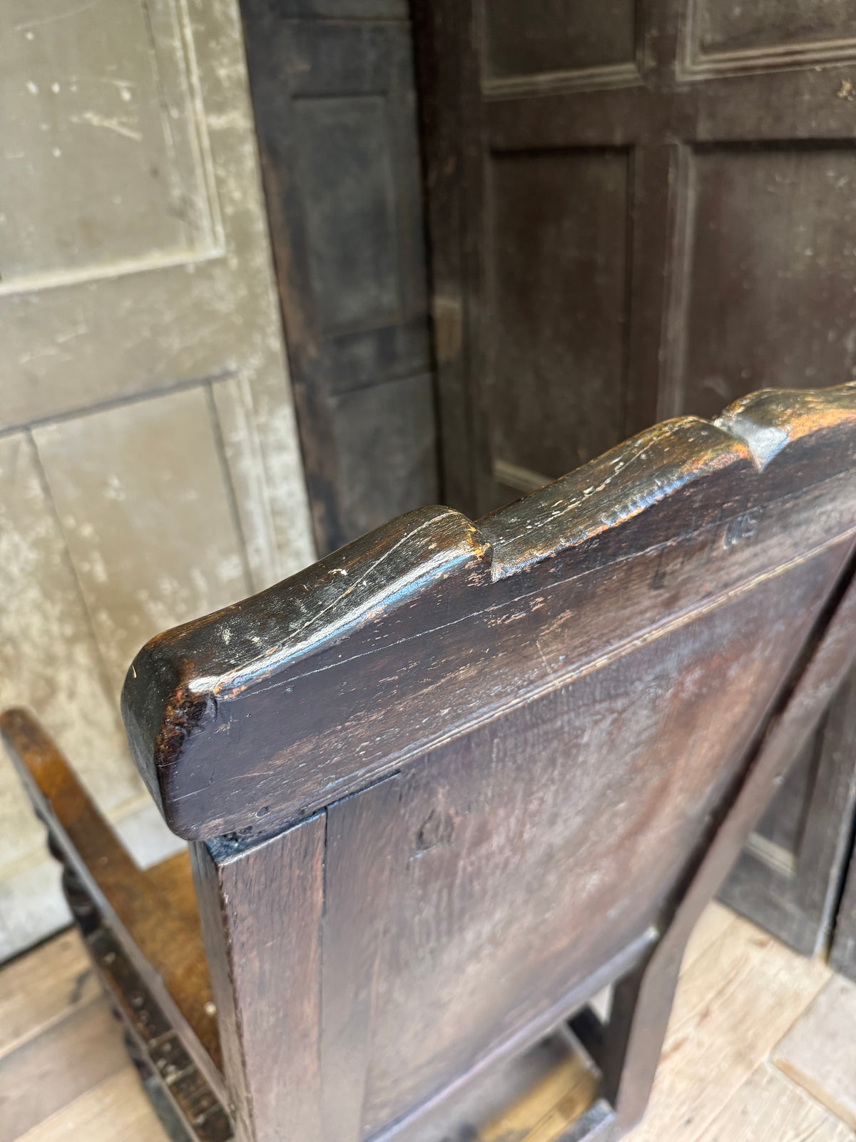 A North country 17th century oak wainscot armchair of excellent colour