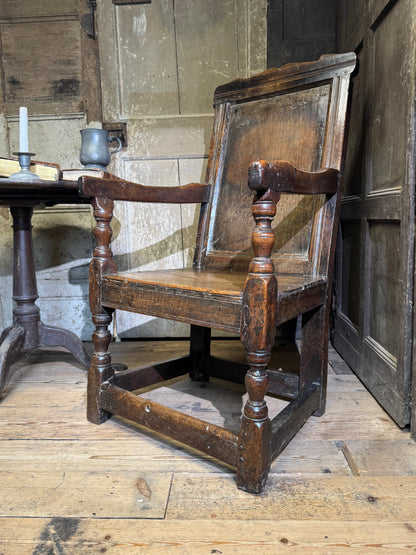A North country 17th century oak wainscot armchair of excellent colour