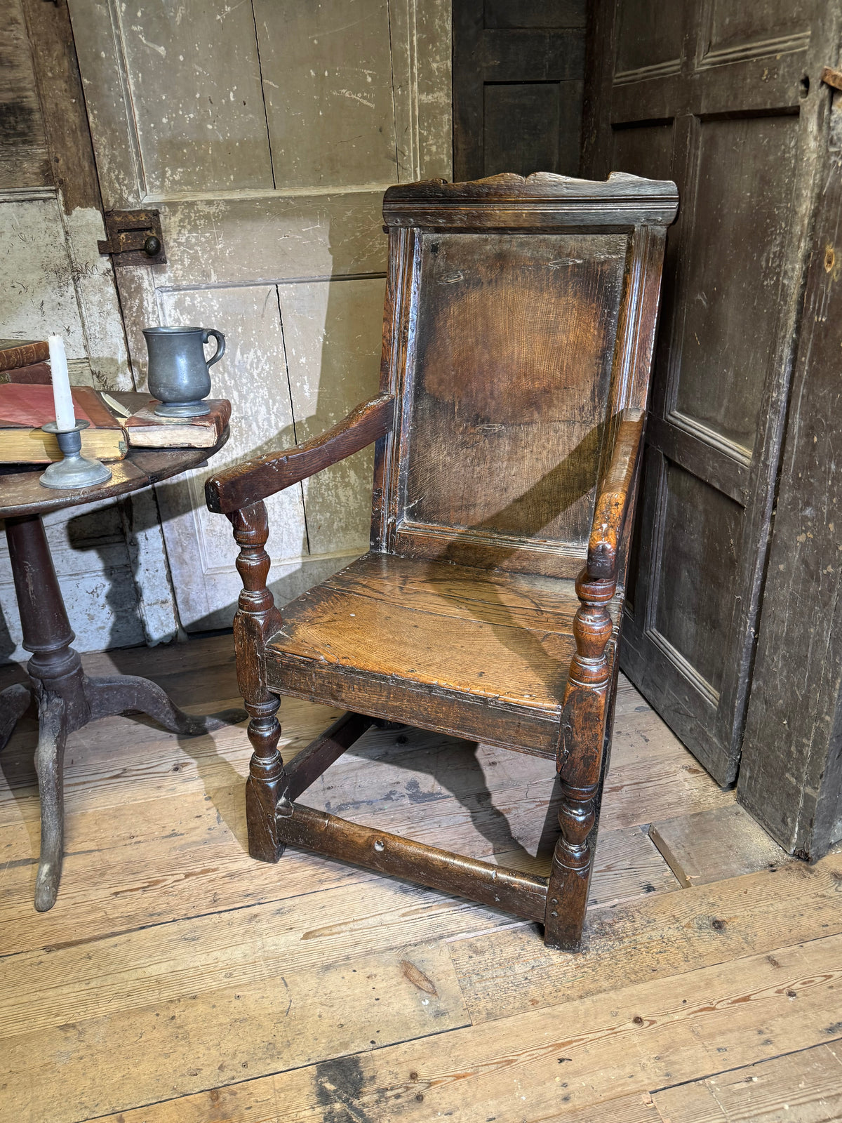 A North country 17th century oak wainscot armchair of excellent colour