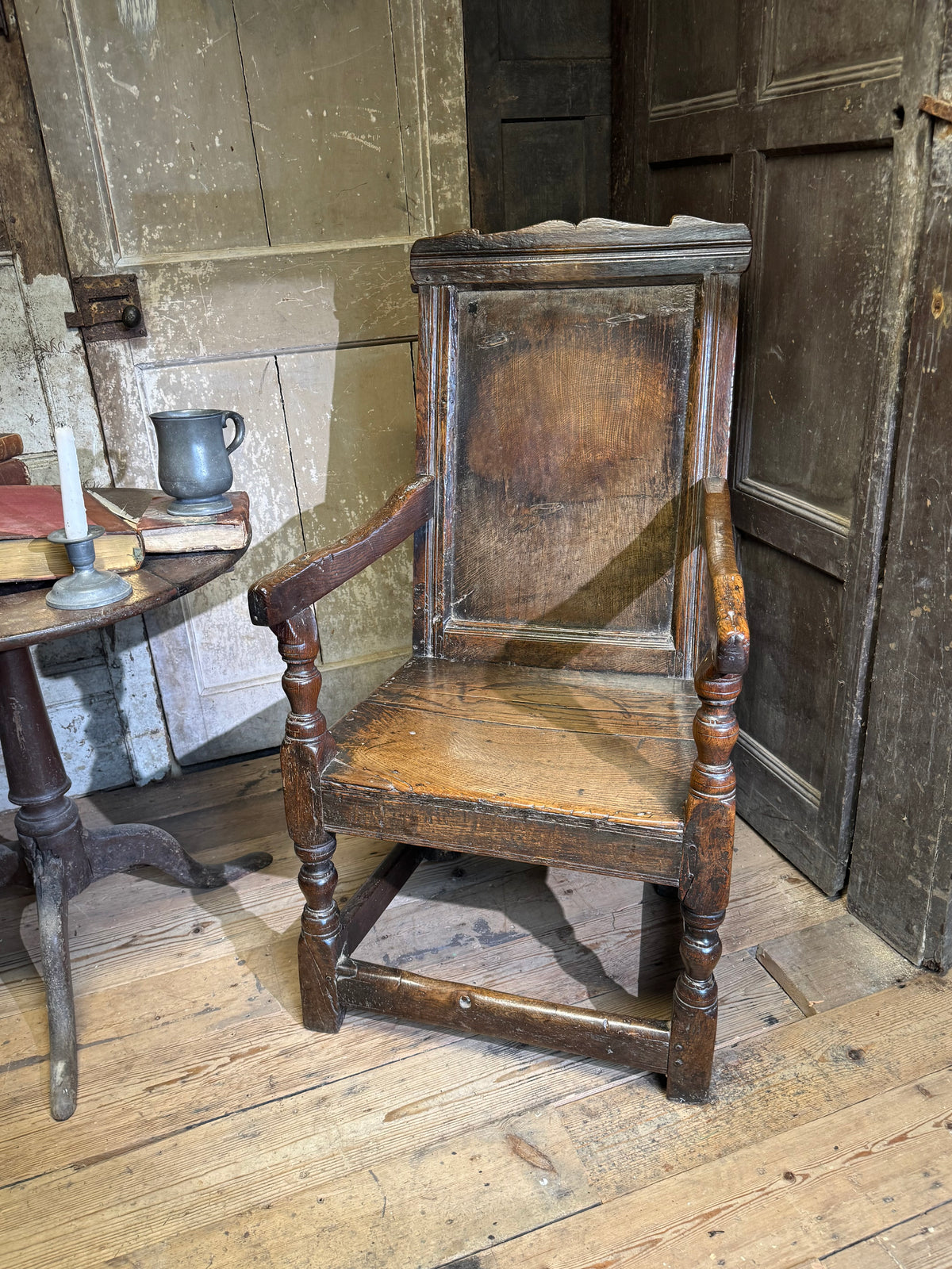 A North country 17th century oak wainscot armchair of excellent colour