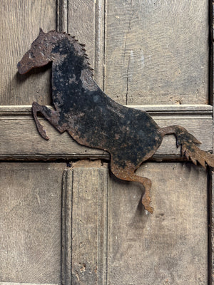 Early 20th century sheet metal galloping horse