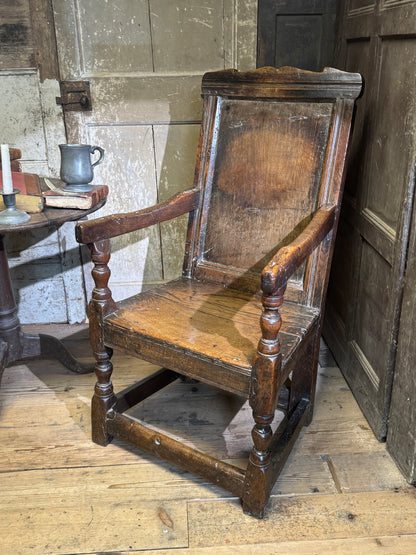 A North country 17th century oak wainscot armchair of excellent colour