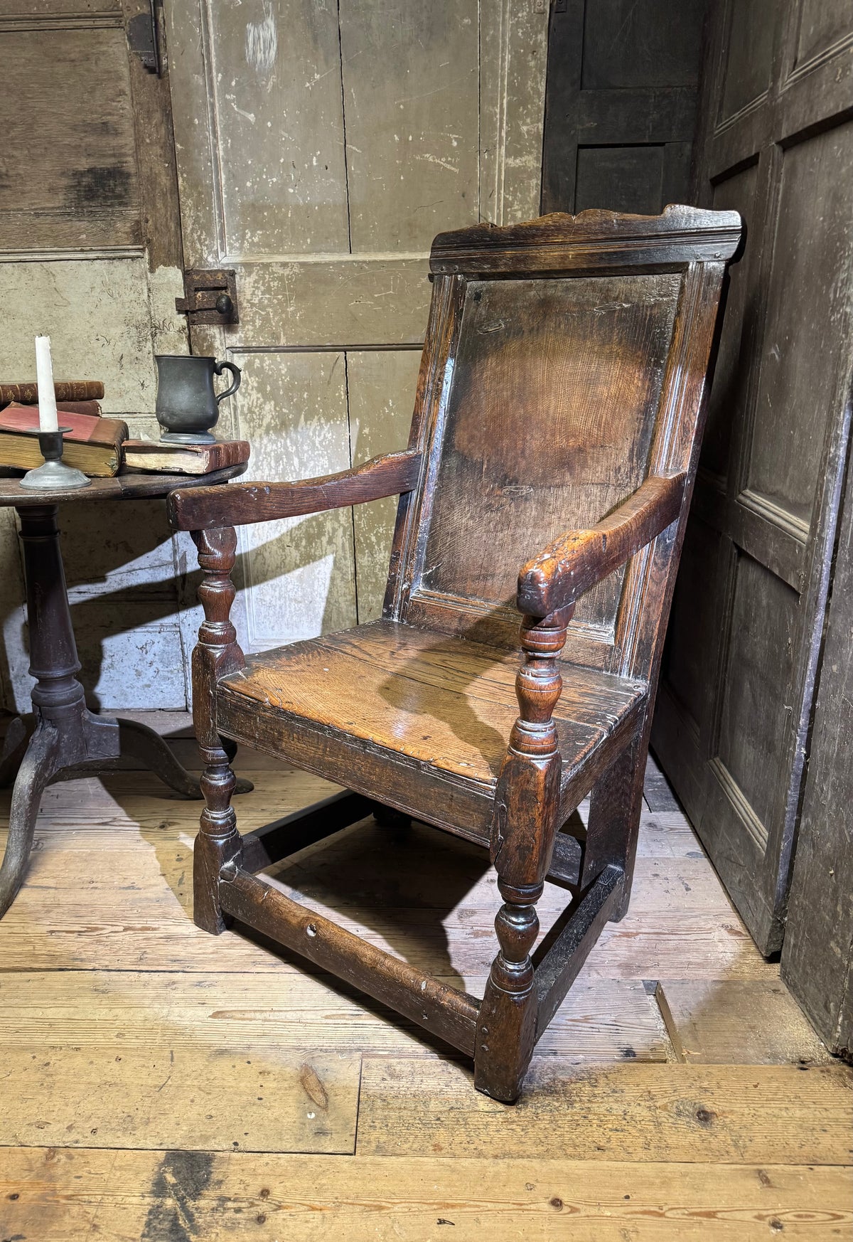 A North country 17th century oak wainscot armchair of excellent colour