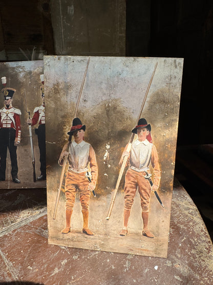 An unusual set of 4 early 20th century painted soldiers on panel