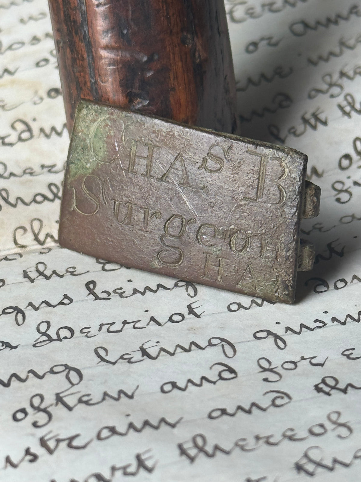 An unusual  George III brass clasp for "Chas B, Surgeon"
