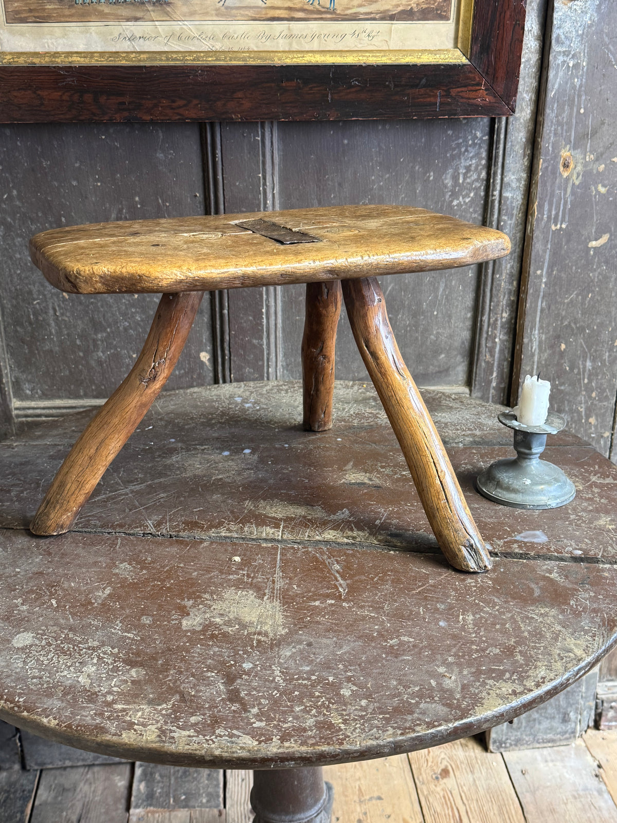 18th century vernacular oak stool with hedgerow splayed legs and blacksmith repairs c. 1790