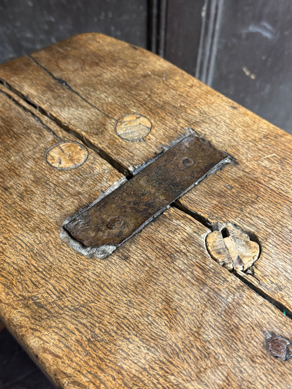 18th century vernacular oak stool with hedgerow splayed legs and blacksmith repairs c. 1790