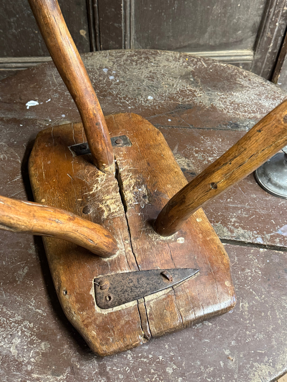 18th century vernacular oak stool with hedgerow splayed legs and blacksmith repairs c. 1790