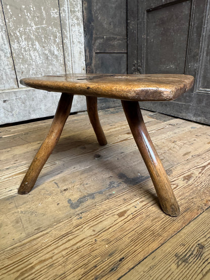 18th century vernacular oak stool with hedgerow splayed legs and blacksmith repairs c. 1790