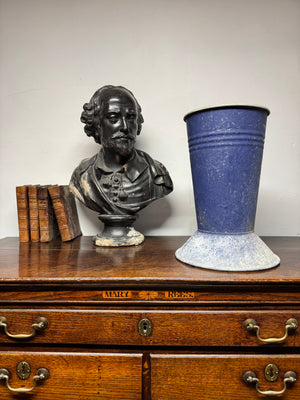 A large mid century tole florist vase in blue