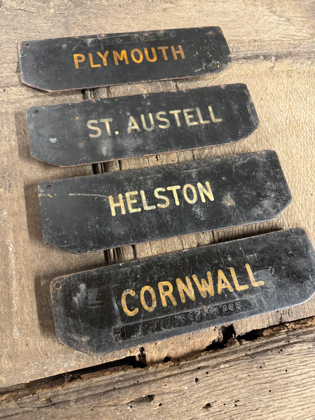 A set of four tole West Country Post office delivery location signs