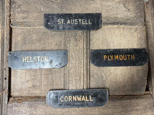 A set of four tole West Country Post office delivery location signs