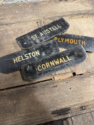 A set of four tole West Country Post office delivery location signs