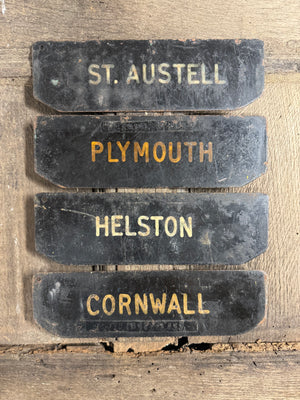 A set of four tole West Country Post office delivery location signs