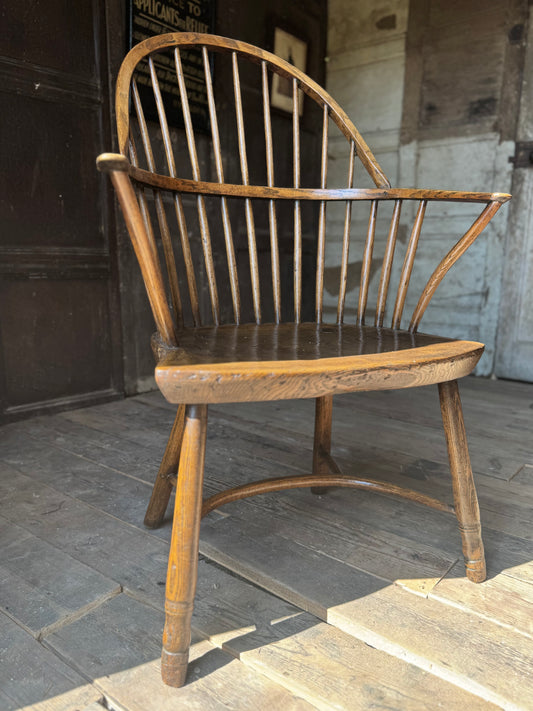 A George III West Country elm & ash Windsor armchair with crinoline  stretcher, c.1800–1820
