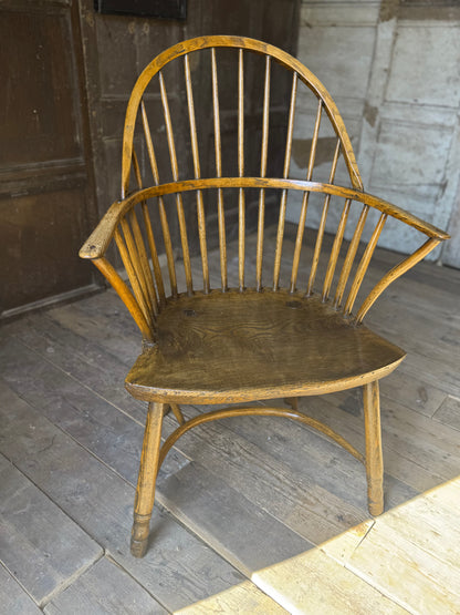 A George III West Country elm & ash Windsor armchair with crinoline  stretcher, c.1800–1820
