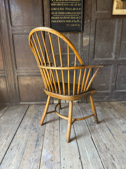 A George III West Country elm & ash Windsor armchair with crinoline  stretcher, c.1800–1820