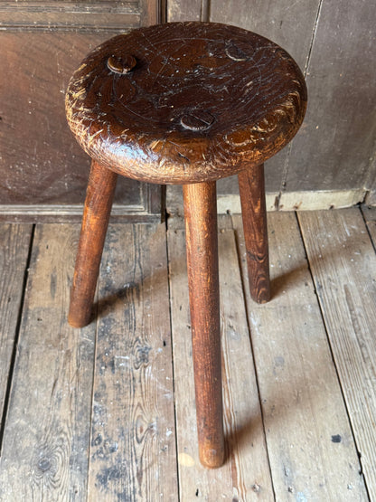 A good size 19th century elm top stool