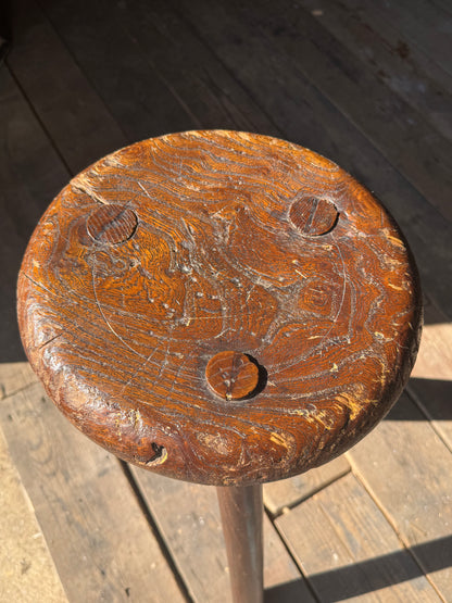 A good size 19th century elm top stool
