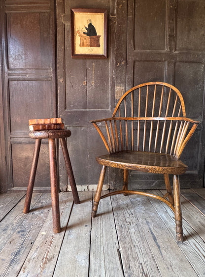 A good size 19th century elm top stool