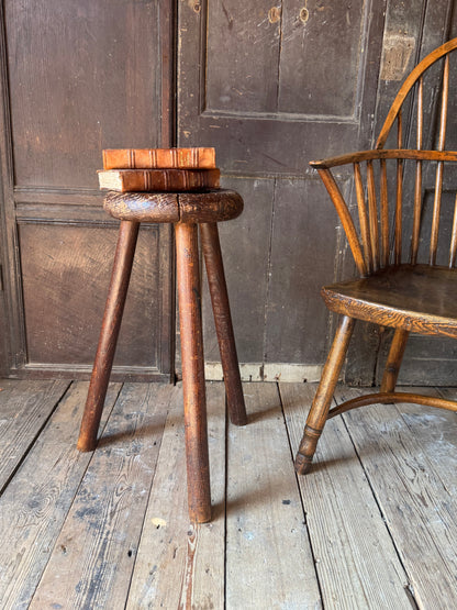 A good size 19th century elm top stool