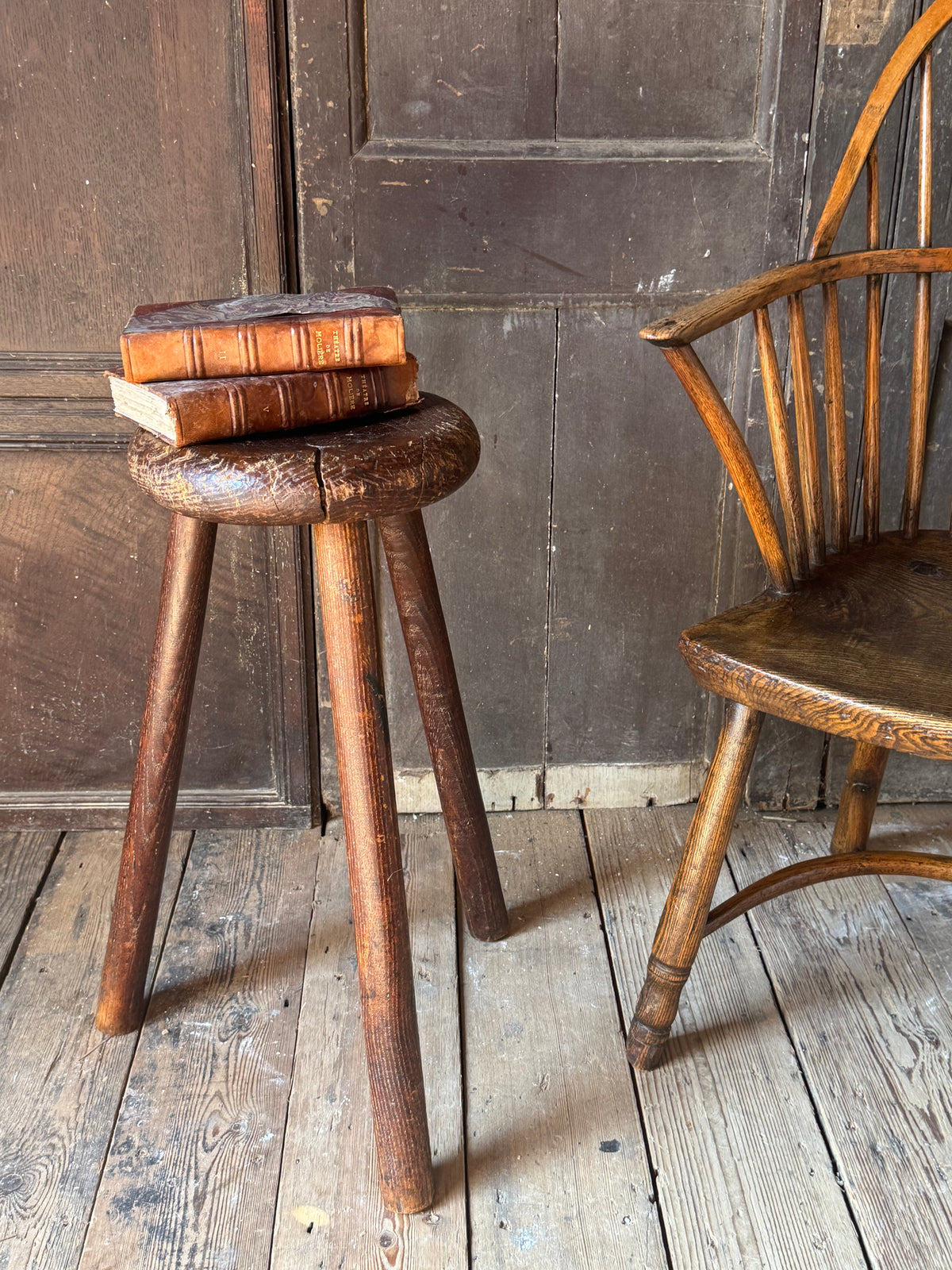 A good size 19th century elm top stool