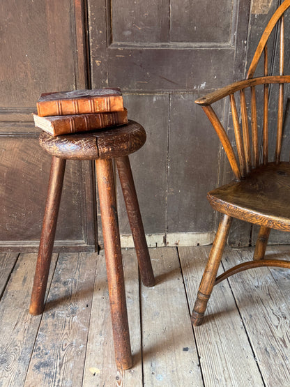A good size 19th century elm top stool