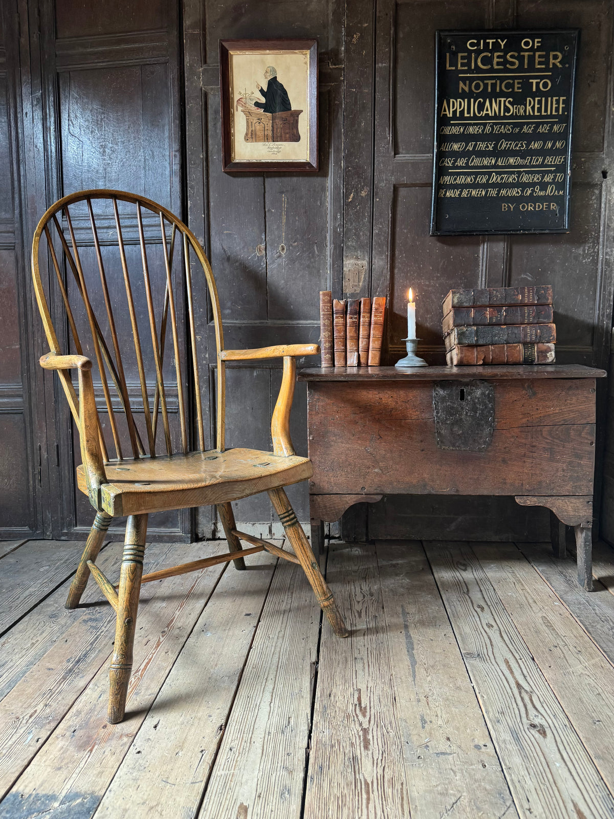 An unusual George III elm and ash high hoop-back Windsor armchair, probably West Country, circa 1800