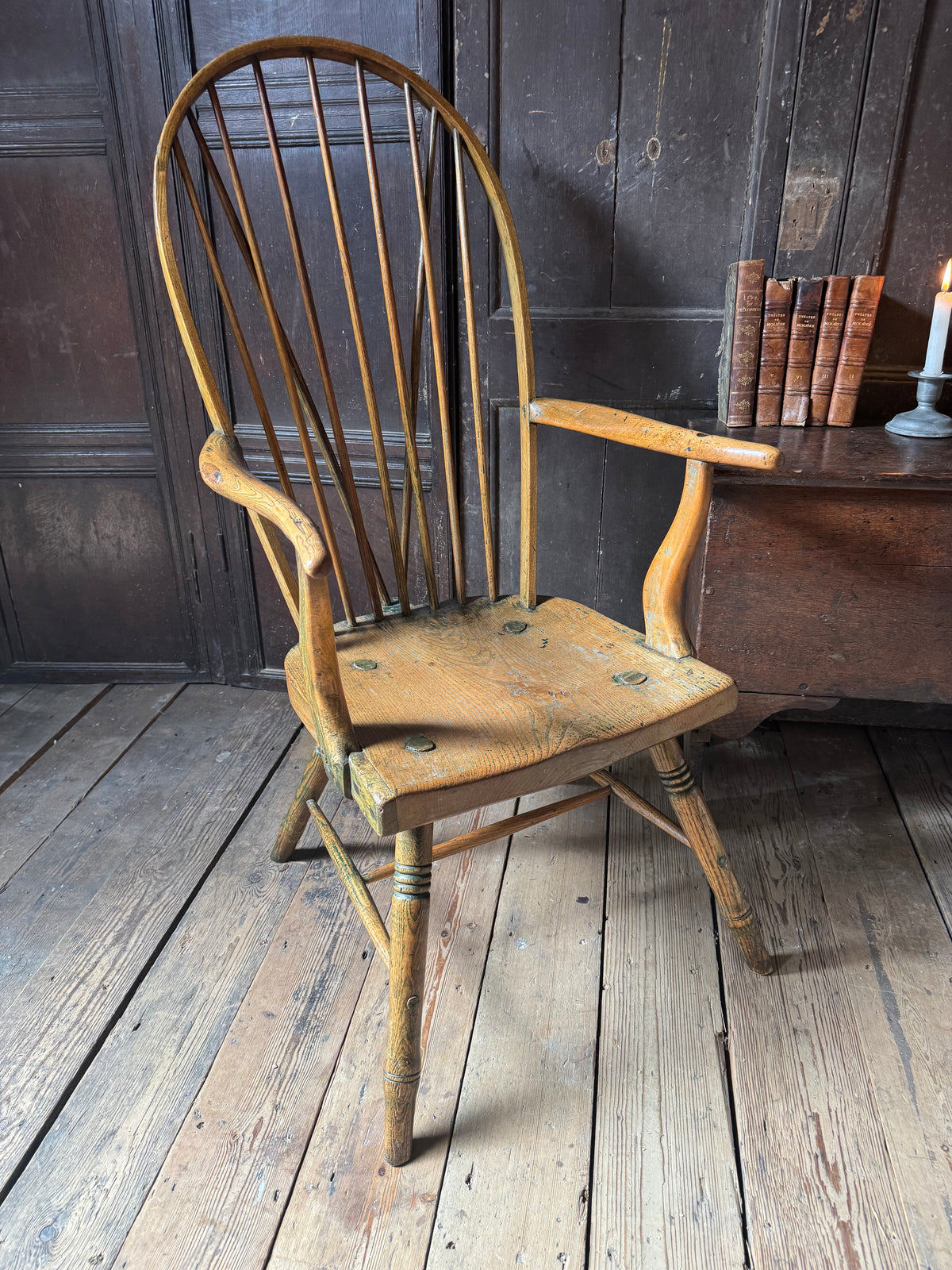 An unusual George III elm and ash high hoop-back Windsor armchair, probably West Country, circa 1800