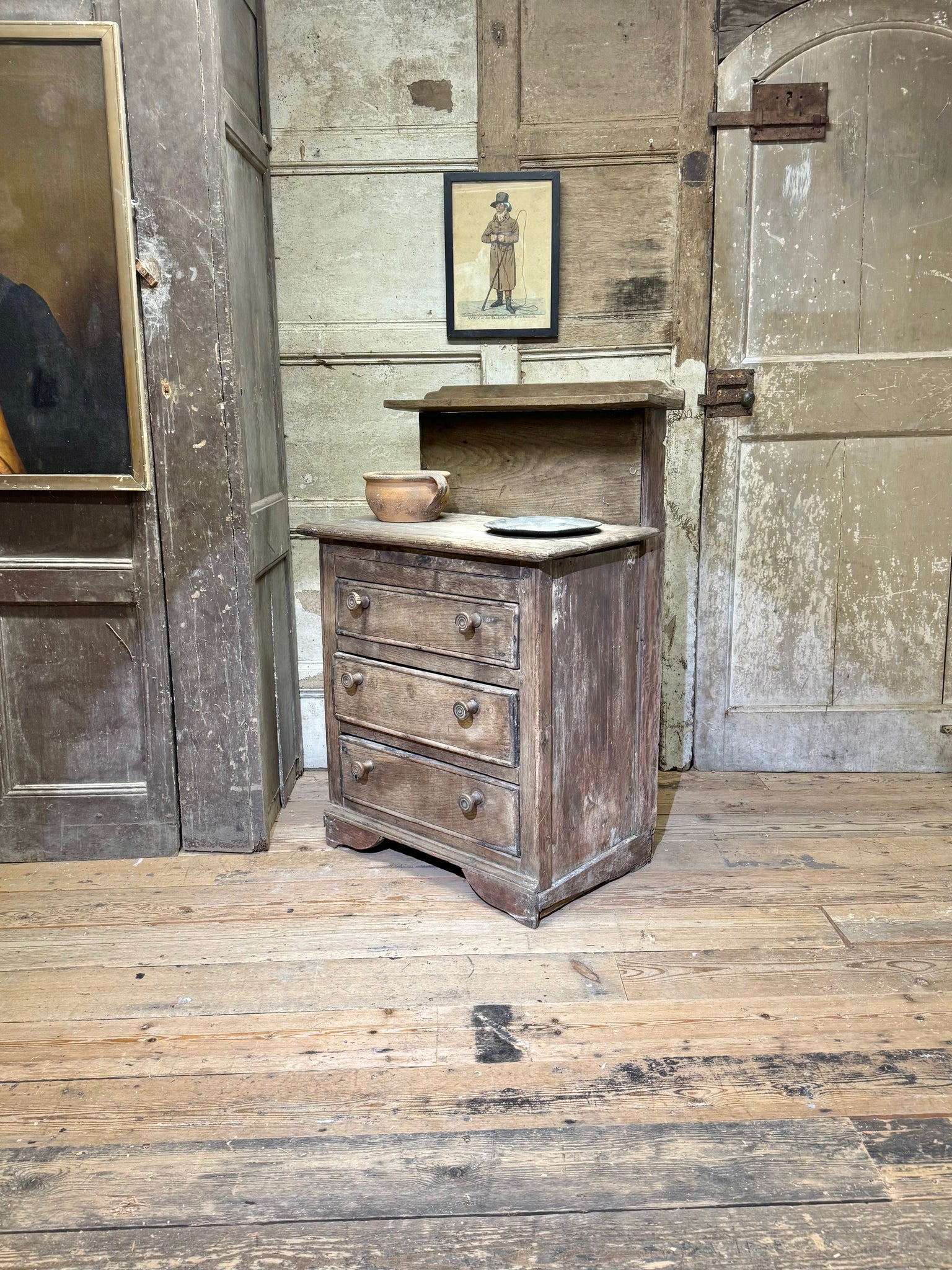 A small early 19th century primiitve oak scullery or servants' quarters chest of drawers