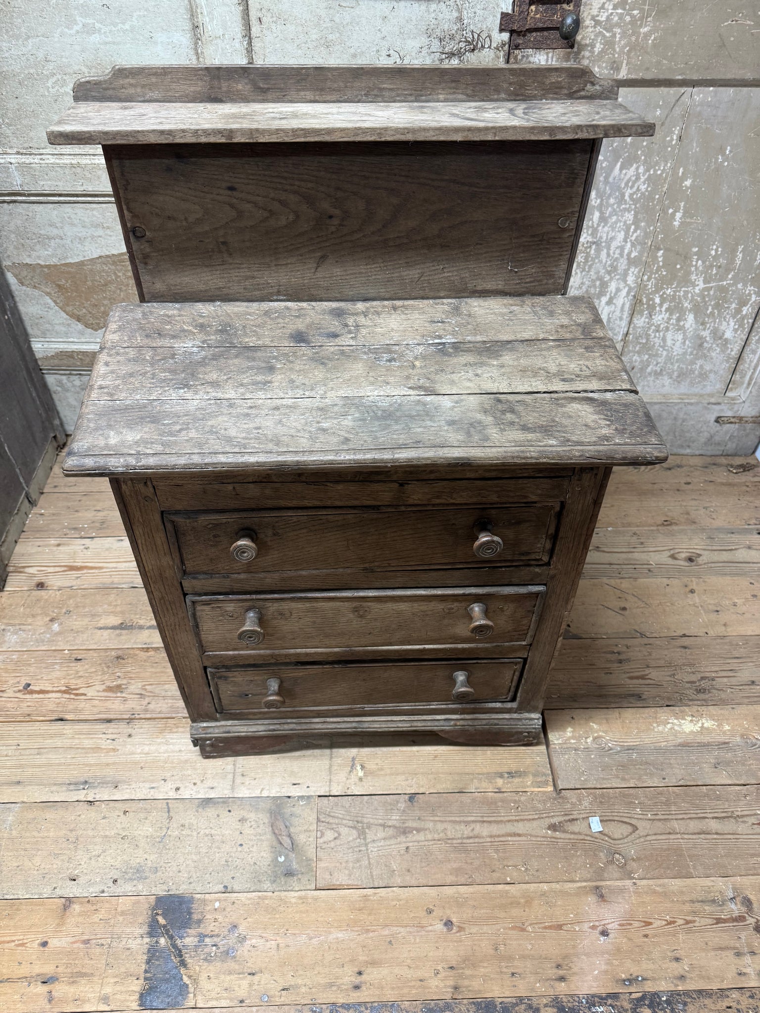 A small early 19th century primiitve oak scullery or servants' quarters chest of drawers