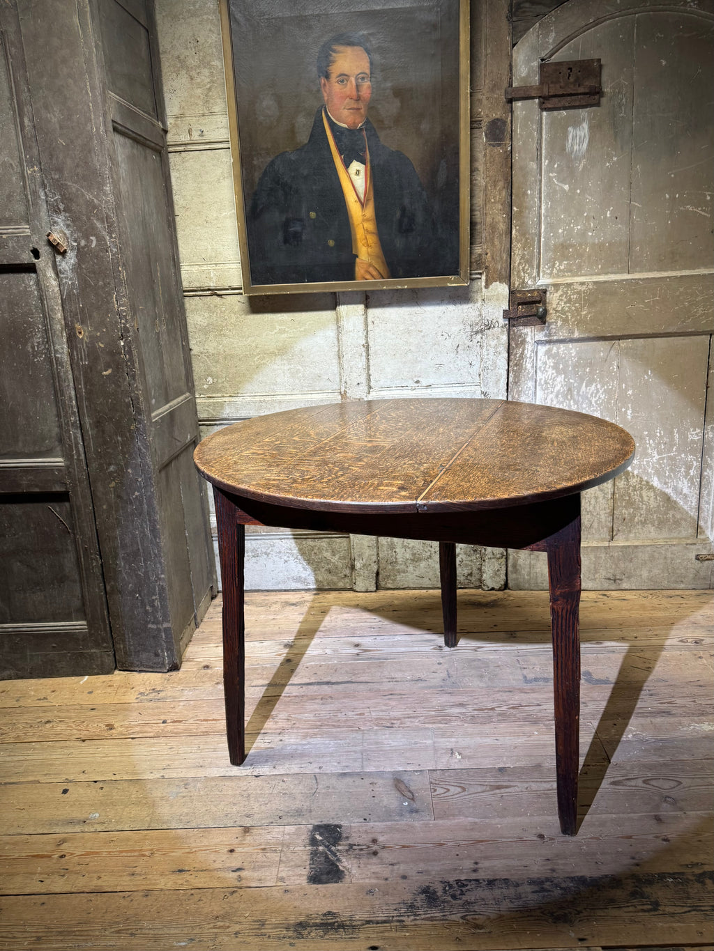 An  early 19th century Welsh oak cricket table of good colour