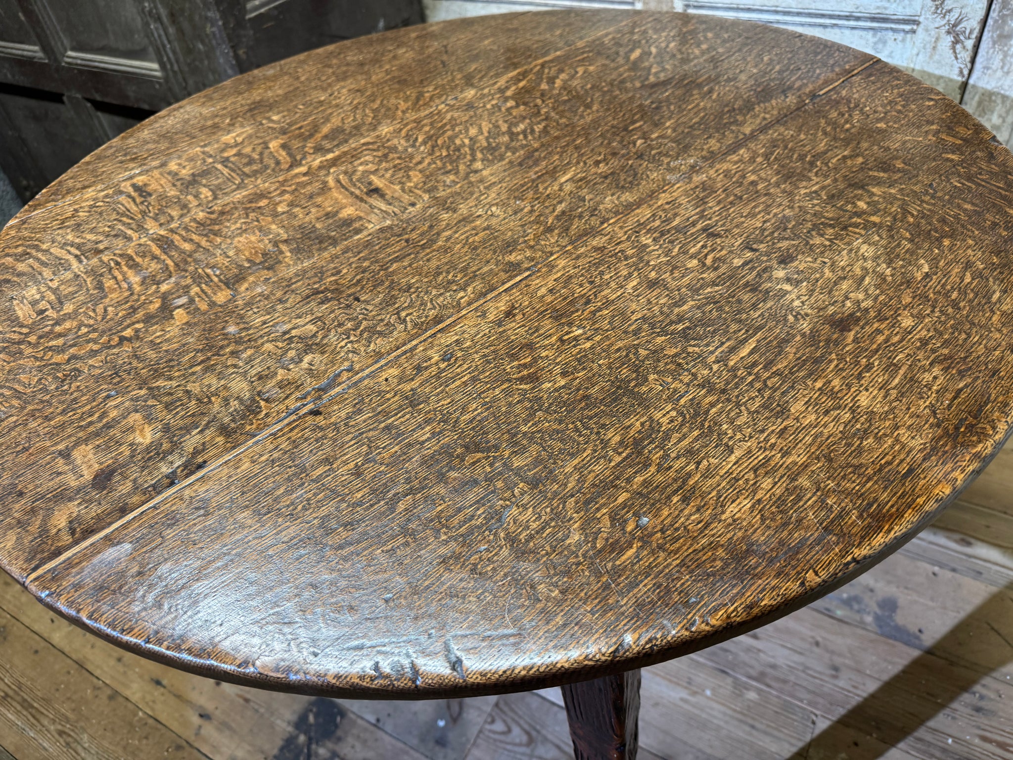 An  early 19th century Welsh oak cricket table of good colour