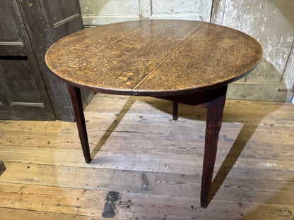 An  early 19th century Welsh oak cricket table of good colour