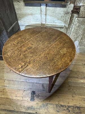 An  early 19th century Welsh oak cricket table of good colour