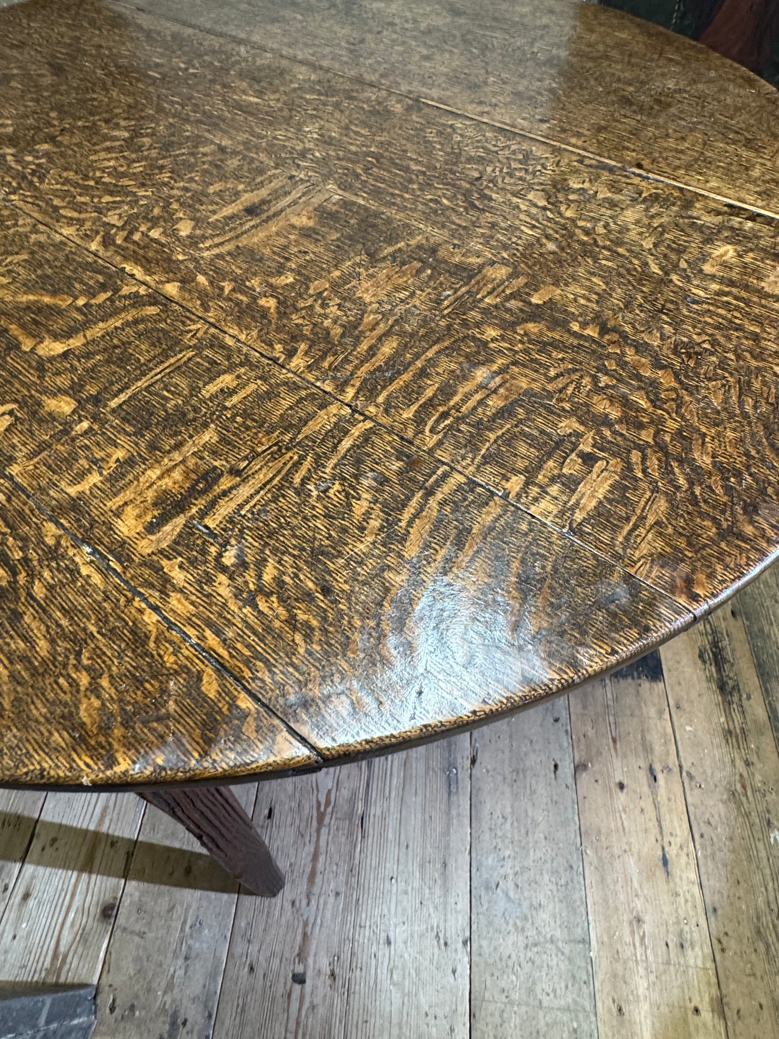 An  early 19th century Welsh oak cricket table of good colour