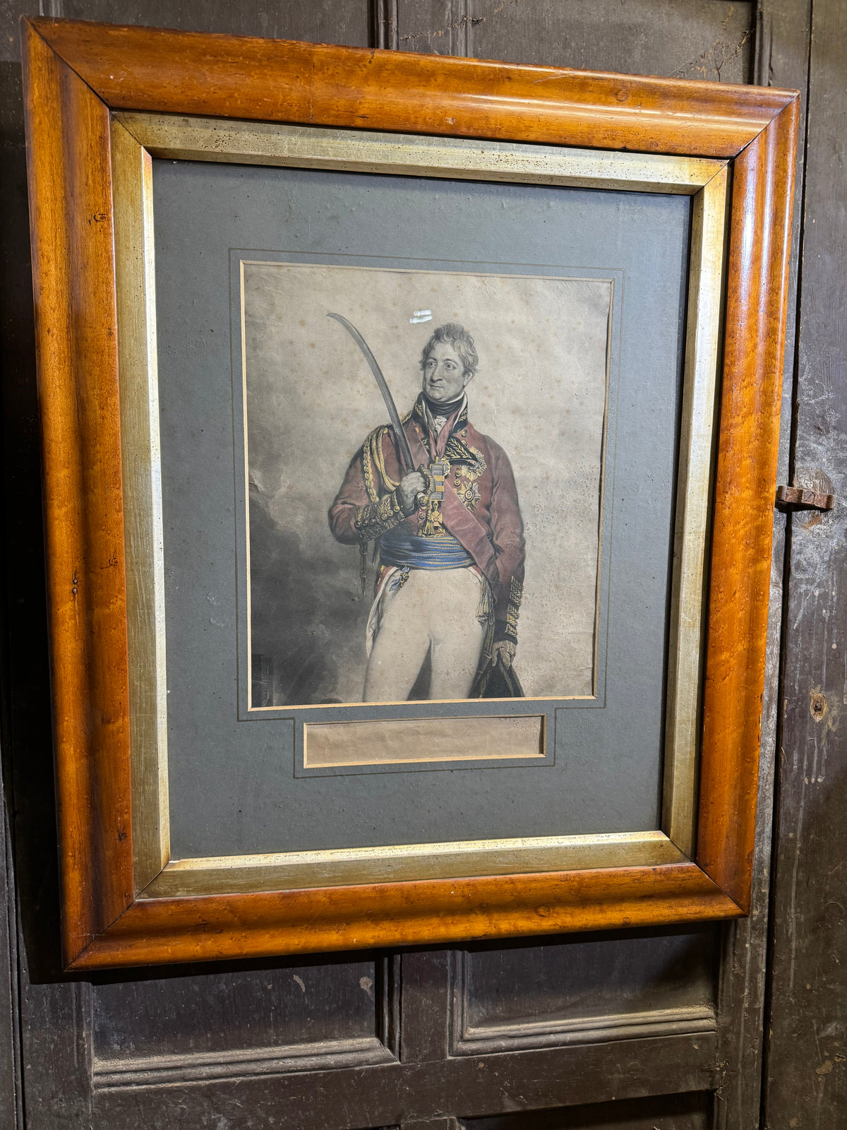 A mid 19th century hand coloured engraving of General Thomas Picton in a birds eye maple frame