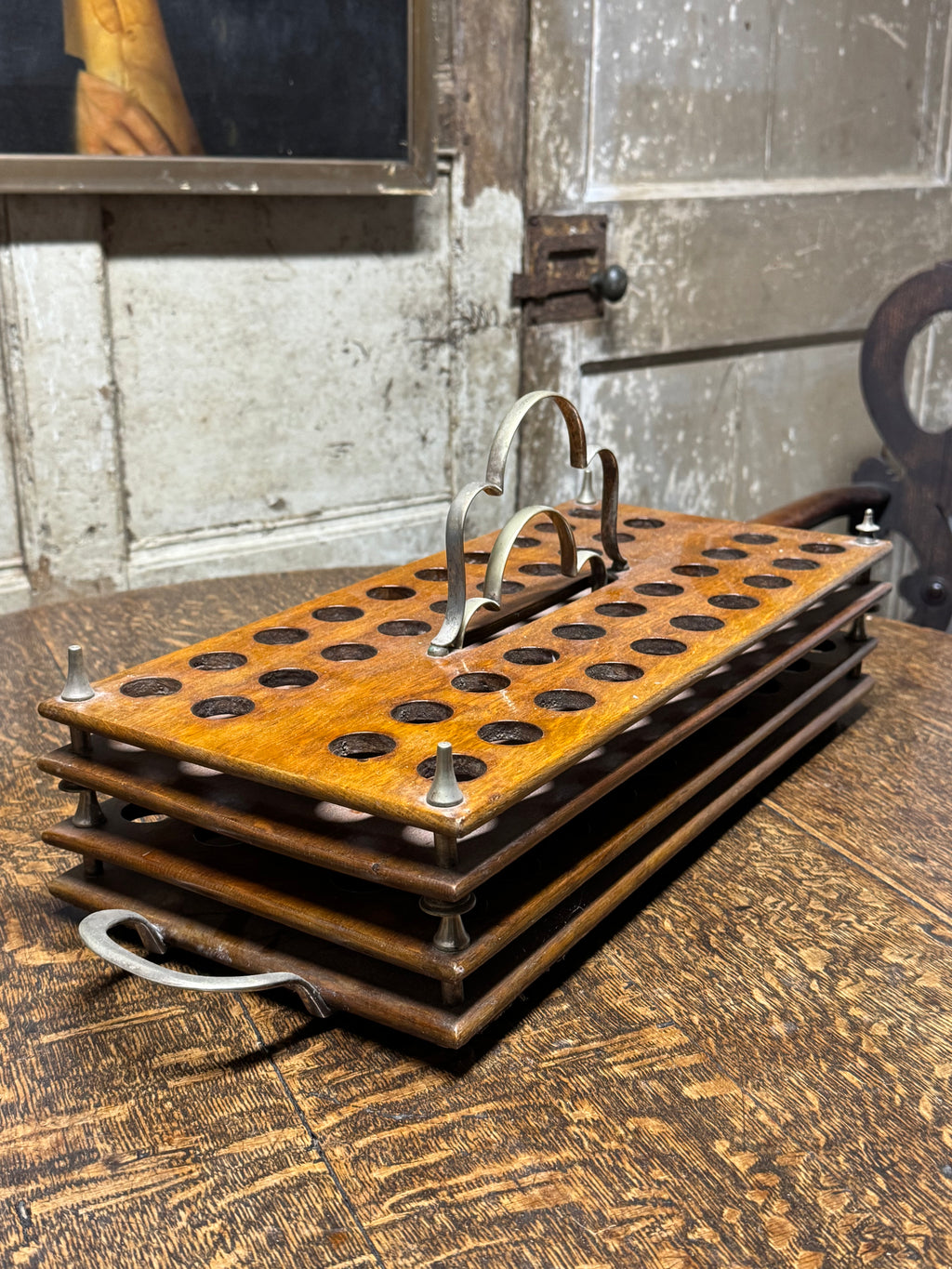 A 19th century pair of stacking communion cup trays recently used for shotgun cartridges