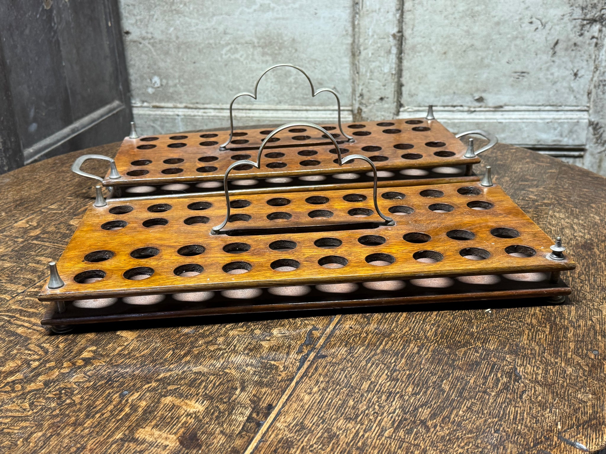 A 19th century pair of stacking communion cup trays recently used for shotgun cartridges
