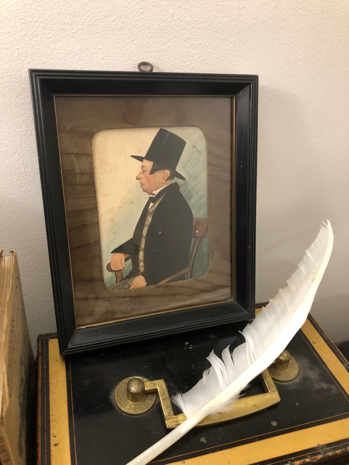 Naive portrait of a gentleman in a top hat c.1850