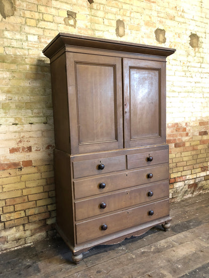 19th century North Country linen press in original oak scumble paint finish
