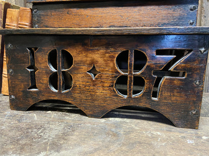 Large oak spoon rack dated 1887