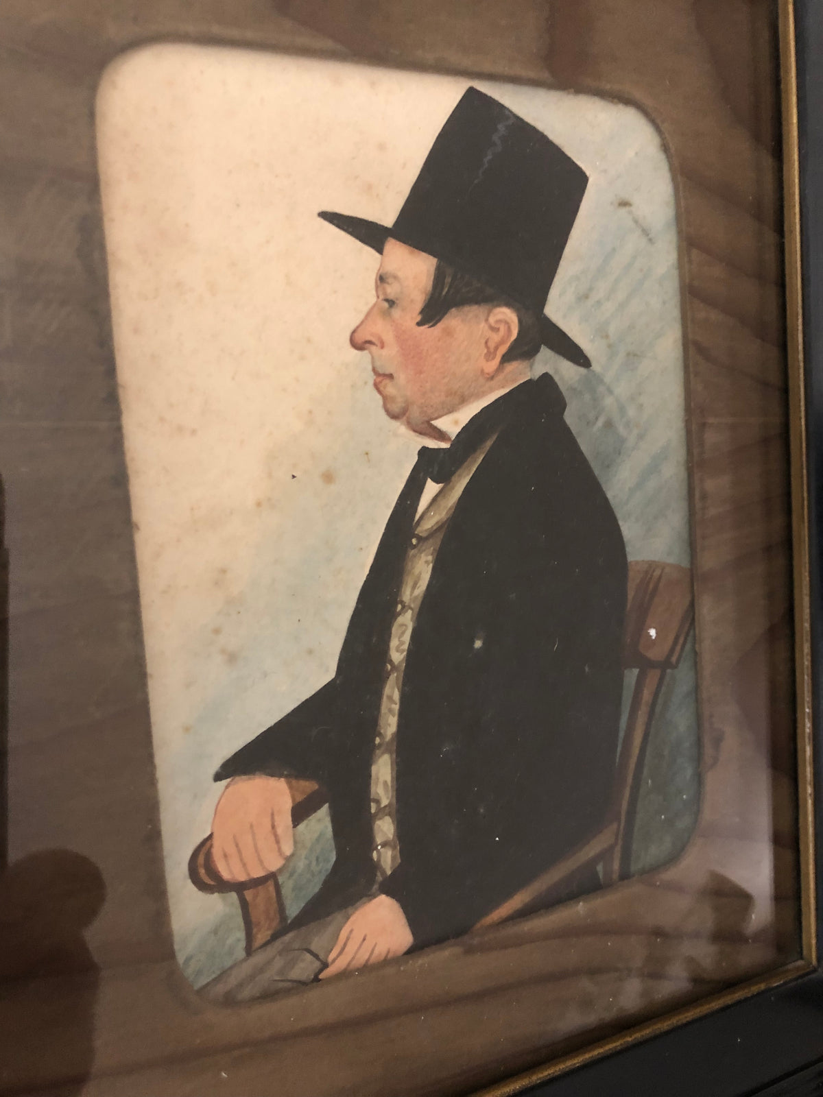 Naive portrait of a gentleman in a top hat c.1850